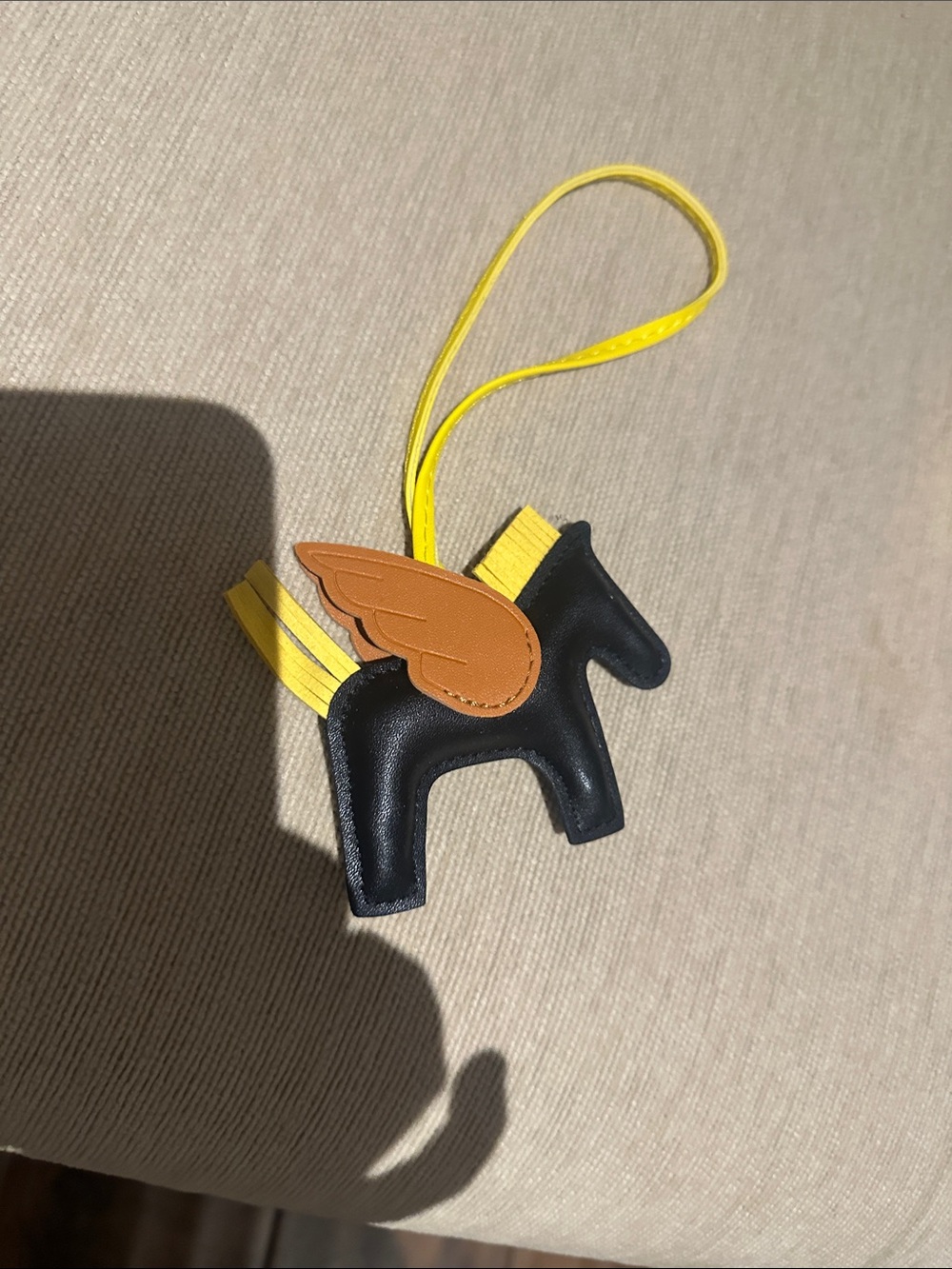 Affordable Fashion Finds Black Pony Bag Charm with Yellow Strap and Brown Wing